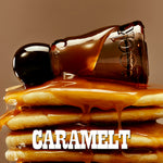A bottle of Caramelt syrup lies on its side on top of a stack of pancakes, with thick caramel sauce dripping over them. The word 'CARAMELT' is displayed in bold white letters at the bottom against a warm brown background.