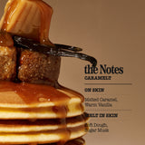 A close-up of a stack of pancakes topped with thick caramel sauce and a vanilla bean, next to text reading 'the Notes CARAMELT' and scent notes 'ON SKIN' and 'MELT IN SKIN'.