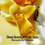 A close-up of a transparent perfume bottle filled with golden yellow liquid, surrounded by citrus peel and a dark green leaf. The embossed brand name 'Knock' is visible on the bottle, with text overlay reading 'Deep Scent, Soft on Skin' and '#Citrus #Fruity #Aromatic'.