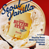 A yellow LIFTING BUTTER STICK SEOUL VANILLA sits atop a tub of vanilla ice cream, presenting a sculpting stick with a firm finish. Text reads Scent Notes: Vanilla Bean, Milk Ice Cream, Jasmine, Musk.