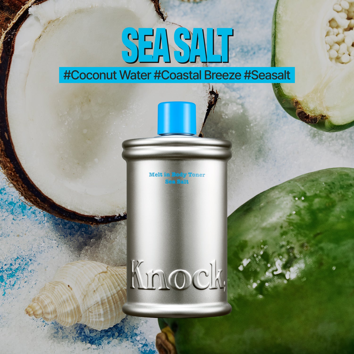 A silver bottle labeled MELT IN BODY TONER stands in front of coconut halves, a green fruit, and seashells. Text above reads SEA SALT with hashtags #CoconutWater #CoastalBreeze #Seasalt. Experience the refreshing feel of this moisturizing body toner that absorbs instantly for a long-lasting scent.
