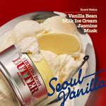 An open jar of FIRMING BODY BUTTER SEOUL VANILLA sits amidst scoops of vanilla ice cream and a scoop, with text highlighting scent notes of Vanilla Bean, Milk Ice Cream, Jasmine, and Musk. This firming butter deeply hydrates to deliver smooth skin and intense moisture.