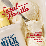 Here’s a rewritten version using your product data: A close-up shot shows creamy vanilla ice cream being scooped, next to a yellow pump bottle labeled “WHIPPING MILK WASH SEOUL VANILLA.” Red script spells out “Seoul Vanilla,” while red text highlights scent notes of Vanilla Bean, Milk Ice Cream, Jasmine, and Musk. This soft-foaming body wash delivers gentle hydration and an indulgent fragrance for a truly luxurious cleansing experience.