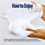 Two hands holding and massaging thick, white foam with text: How to Enjoy. Lather a generous amount of WHIPPING MILK WASH SEOUL VANILLA onto wet skin for a rich, soft foam, then gently massage and rinse clean.