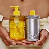 Two bottles of 'Knock' products held by hands against a neutral background